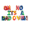Colorful 3D block letters spelling out the phrase 'OH NO ITS A BAD OMEN' in a tie-dye pattern, set against a plain white background.